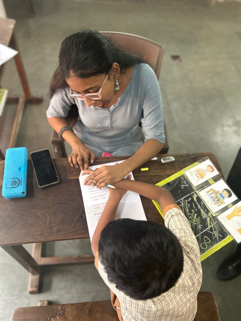One on One activity with a child in BMC school